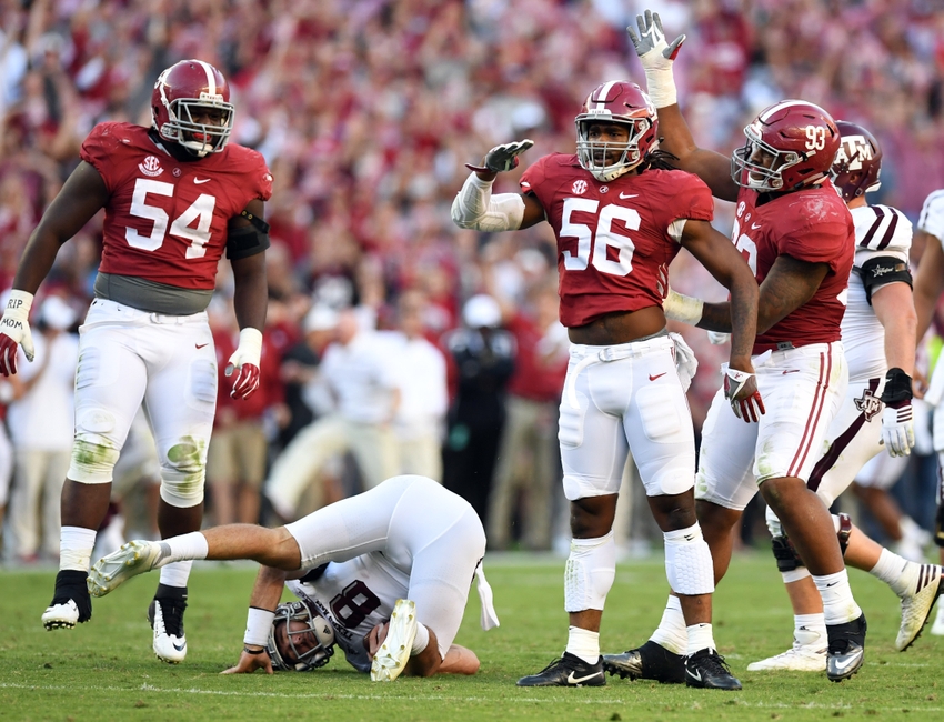 Oct 22, 2016; Tuscaloosa, AL, USA; Alabama Crimson Tide linebacker Tim Williams (56) celebrates his sack with defensive lineman Jonathan Allen (93) on Texas A&M Aggies quarterback Trevor Knight (8) during the third quarter at Bryant-Denny Stadium. Mandatory Credit: John David Mercer-USA TODAY Sports