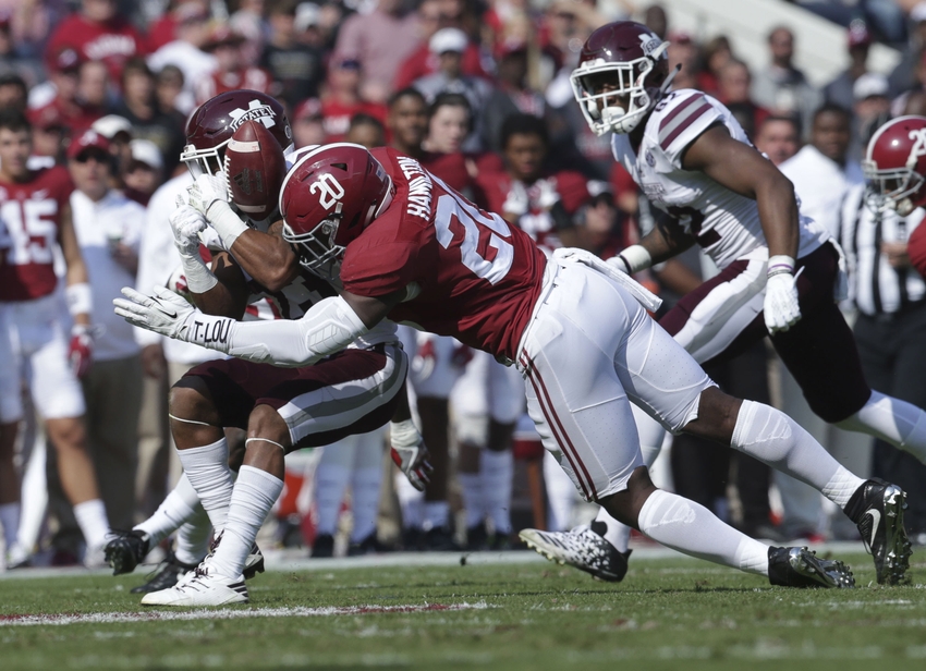 Nov 12, 2016; Tuscaloosa, AL, USA; Mississippi State Bulldogs wide receiver Keith Mixon (23) is hit by Alabama Crimson Tide linebacker Shaun Dion Hamilton (20) at Bryant-Denny Stadium. Mandatory Credit: Marvin Gentry-USA TODAY Sports
