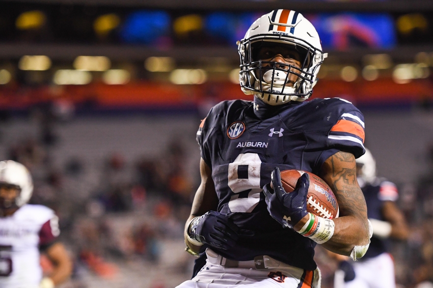 Nov 19, 2016; Auburn, AL, USA; Auburn Tigers running back Kam Martin (9) scores a touchdown during the fourth quarter against the Alabama A&M Bulldogs at Jordan Hare Stadium. Mandatory Credit: Shanna Lockwood-USA TODAY Sports