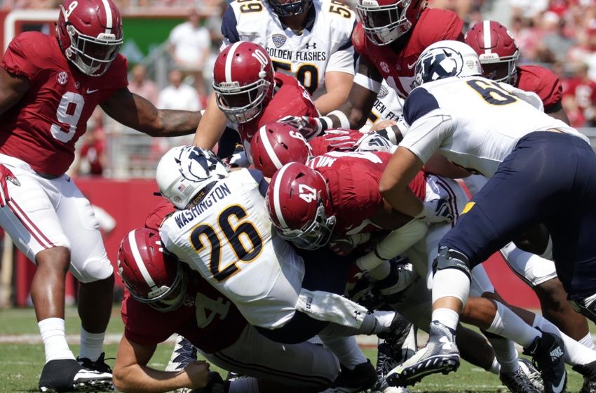 Sep 24, 2016; Tuscaloosa, AL, USA; Alabama Crimson Tide defensive lineman Dakota Ball (44) , linebacker Christian Miller (47) ,defensive back Laurence Hootie Jones (6) and linebacker Reuben Foster (10) hit Kent State Golden Flashes running back Myles Washington (26) at Bryant-Denny Stadium. Mandatory Credit: Marvin Gentry-USA TODAY Sports