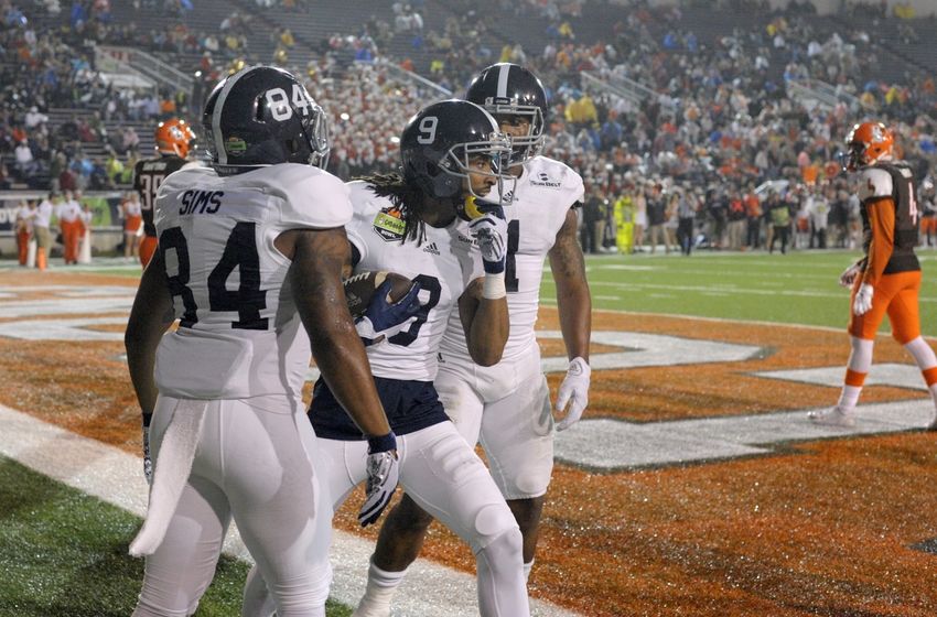 Dec 23, 2015; Mobile, AL, USA; Georgia Southern Eagles wide receiver Montay Crockett (9) celebrates his touchdown pass reception with wide receiver Andre Sims (84) and running back LA Ramsby (1) against the Bowling Green Falcons in the second quarter of the 2015 GoDaddy Bowl at Ladd-Peebles Stadium. Mandatory Credit: Glenn Andrews-USA TODAY Sports