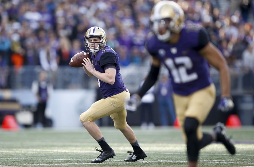 Oct 22, 2016; Seattle, WA, USA; Washington Huskies quarterback Jake Browning (3) eyes wide receiver Aaron Fuller (12) for a touchdown against the Oregon State Beavers during the first quarter at Husky Stadium. Mandatory Credit: Jennifer Buchanan-USA TODAY Sports