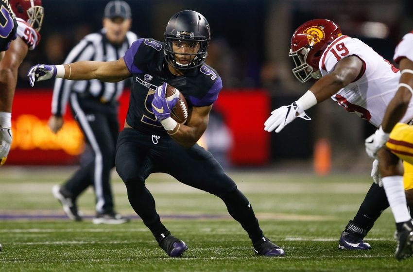 Nov 12, 2016; Seattle, WA, USA; Washington Huskies running back Myles Gaskin (9) rushes against the USC Trojans during the first quarter at Husky Stadium. Mandatory Credit: Joe Nicholson-USA TODAY Sports