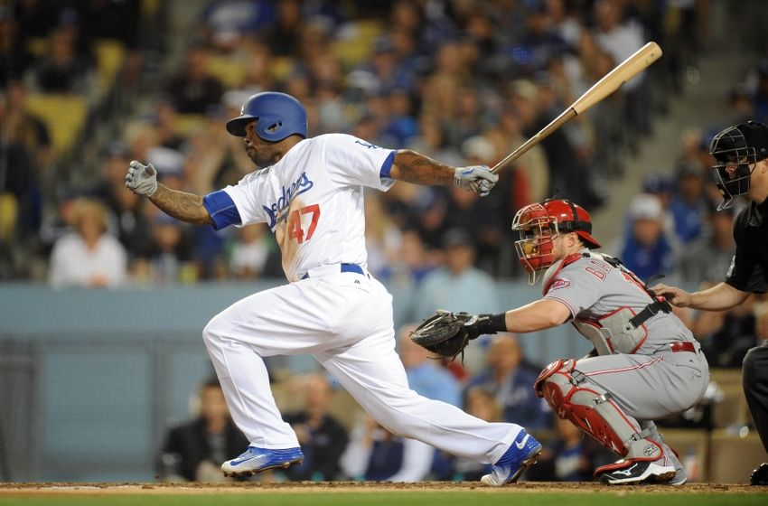 May 23, 2016; Los Angeles, CA, USA; Los Angeles Dodgers left fielder Howie Kendrick (47) hits into a double play on an RBI hit in the sixth inning against Cincinnati Reds at Dodger Stadium. Mandatory Credit: Gary A. Vasquez-USA TODAY Sports