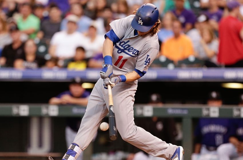 Aug 2, 2016; Denver, CO, USA; Los Angeles Dodgers right fielder Josh Reddick (11) bats in the second inning against the Colorado Rockies at Coors Field. Mandatory Credit: Isaiah J. Downing-USA TODAY Sports