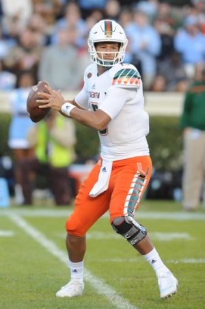Nov 14, 2015; Chapel Hill, NC, USA; Miami Hurricanes quarterback Brad Kaaya (15) passes against the North Carolina Tar Heels during the first half at Kenan Memorial Stadium. The Tar Heels won 59 - 21. Mandatory Credit: Evan Pike-USA TODAY Sports