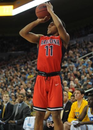 January 7, 2016; Los Angeles, CA, USA; Arizona Wildcats guard Allonzo Trier (11) shoots against UCLA Bruins during the first half at Pauley Pavilion. Mandatory Credit: Gary A. Vasquez-USA TODAY Sports 