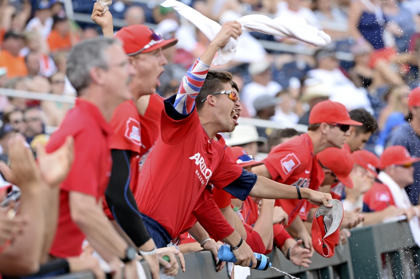 Jun 24, 2016; Omaha, NE, USA; The Arizona Wildcats bench cheer action against the Oklahoma State Cowboys in the 2016 College World Series at TD Ameritrade Park. Arizona defeated Oklahoma State 9-3. Mandatory Credit: Steven Branscombe-USA TODAY Sports