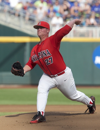 Jun 22, 2016; Omaha, NE, USA; Arizona Wildcats pitcher JC Cloney (27) throws against the UC Santa Barbara Gauchos in the 2016 College World Series at TD Ameritrade Park. Mandatory Credit: Bruce Thorson-USA TODAY Sports