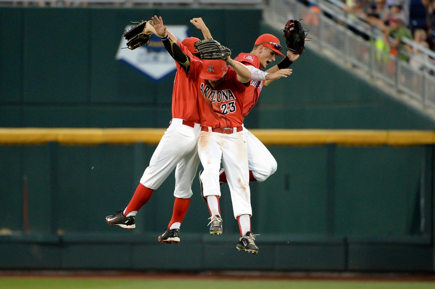 Jun 22, 2016; Omaha, NE, USA; Arizona Wildcats outfielder Jared Oliva (42) and outfielder Justin Behnke (4) and outfielder Zach Gibbons (23) celebrate the win against the UC Santa Barbara Gauchos in the 2016 College World Series at TD Ameritrade Park. Arizona defeated UC Santa Barbara 3-0. Mandatory Credit: Steven Branscombe-USA TODAY Sports