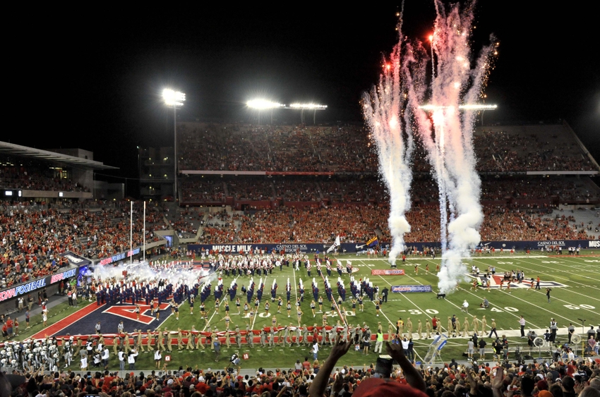 Sep 17, 2016; Tucson, AZ, USA; The Arizona Wildcats run onto the field before the game against the Hawaii Warriors at Arizona Stadium. Mandatory Credit: Casey Sapio-USA TODAY Sports