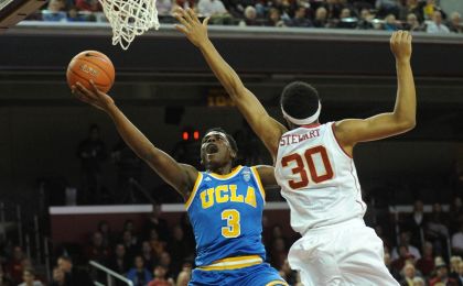 February 4, 2016; Los Angeles, CA, USA; UCLA Bruins guard Aaron Holiday (3) moves to the basket against Southern California Trojans guard Elijah Stewart (30) during the first half at Galen Center. Mandatory Credit: Gary A. Vasquez-USA TODAY Sports