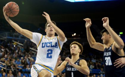 November 17, 2016; Los Angeles, CA, USA; UCLA Bruins guard Lonzo Ball (2) moves to the basket against San Diego Toreros guard Tyler Williams (1) and forward Frank Ryder (30) during the second half at Pauley Pavilion. Mandatory Credit: Gary A. Vasquez-USA TODAY Sports