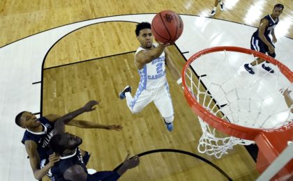 Apr 4, 2016; Houston, TX, USA; North Carolina Tar Heels guard Joel Berry II (2) shoots the ball against Villanova Wildcats forward Daniel Ochefu (23) during the first half in the championship game of the 2016 NCAA Men