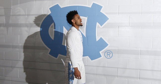 Apr 4, 2016; Houston, TX, USA; North Carolina Tar Heels guard Joel Berry II (2) walks past the team logo prior to the game against the Villanova Wildcats in the championship game of the 2016 NCAA Men