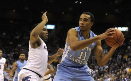 Nov 24, 2015; Kansas City, MO, USA; North Carolina Tar Heels forward Brice Johnson (11) looks to pass the ball as Kansas State Wildcats guard Carlbe Ervin II (1) defends in the second half at Sprint Center. The Tar Heels won 80-70. Mandatory Credit: John Rieger-USA TODAY Sports