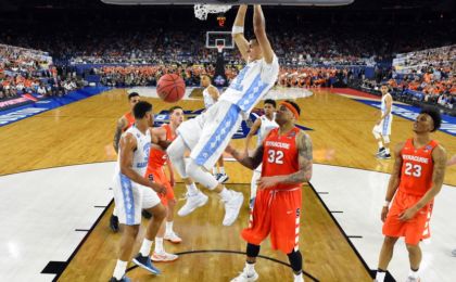 Apr 2, 2016; Houston, TX, USA; North Carolina Tar Heels forward Justin Jackson (44) dunks the ball against Syracuse Orange center DaJuan Coleman (32) during the second half in the 2016 NCAA Men