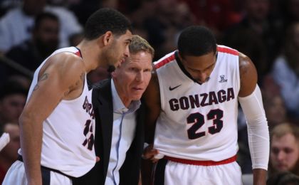 March 7, 2016; Las Vegas, NV, USA; Gonzaga Bulldogs head coach Mark Few (center) instructs guard Josh Perkins (13) and guard Eric McClellan (23) against the BYU Cougars during the second half in the semifinals of the West Coast Conference tournament at Orleans Arena. Mandatory Credit: Kyle Terada-USA TODAY Sports