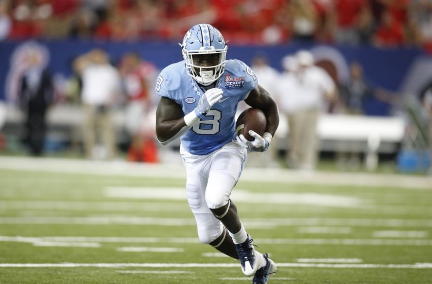 Sep 3, 2016; Atlanta, GA, USA;  North Carolina Tar Heels running back T.J. Logan (8) runs the ball against the Georgia Bulldogs during the second quarter of the 2016 Chick-Fil-A Kickoff game at Georgia Dome. Mandatory Credit: Brett Davis-USA TODAY Sports