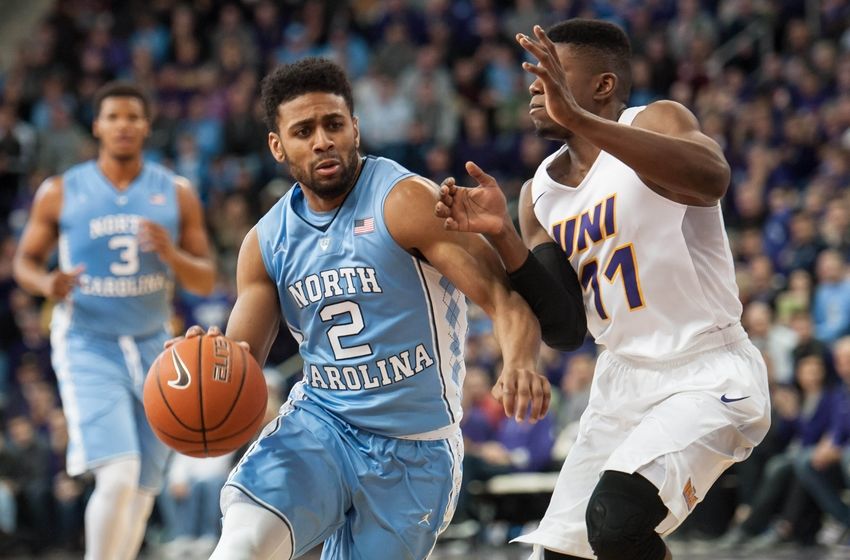 Nov 21, 2015; Cedar Falls, IA, USA; North Carolina Tar Heels guard Joel Berry II (2) is defended by Northern Iowa Panthers guard Wes Washpun (11) during the second half at McLeod Center. Northern Iowa won 71-67. Mandatory Credit: Jeffrey Becker-USA TODAY Sports