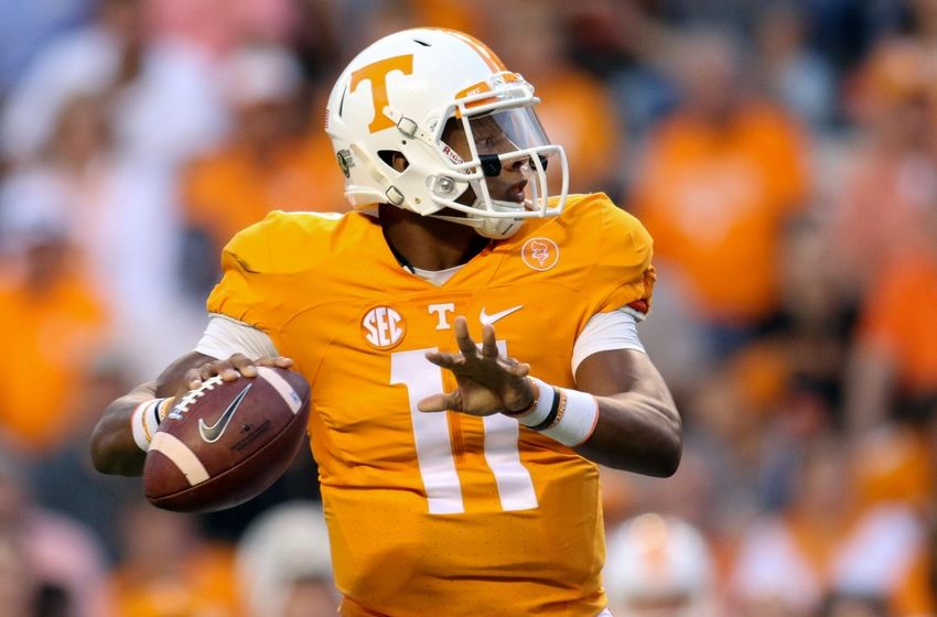 Sep 19, 2015; Knoxville, TN, USA; Tennessee Volunteers quarterback Joshua Dobbs (11) throws a touchdown pass to Tennessee Volunteers wide receiver Preston Williams (7) (not pictured) during the first quarter against the Western Carolina Catamounts at Neyland Stadium. Mandatory Credit: Randy Sartin-USA TODAY Sports