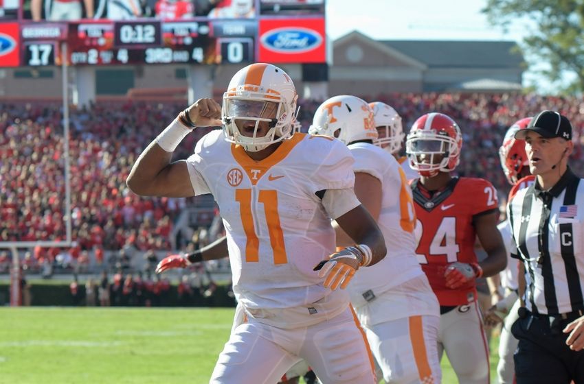 Oct 1, 2016; Athens, GA, USA; Tennessee Volunteers quarterback Joshua Dobbs (11) reacts after scoring a touchdown against the Georgia Bulldogs during the second quarter at Sanford Stadium. Mandatory Credit: Dale Zanine-USA TODAY Sports