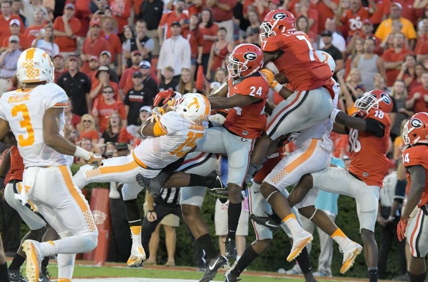 Oct 1, 2016; Athens, GA, USA; Tennessee Volunteers wide receiver Jauan Jennings (15) catches a game winning touchdown pass in front of Georgia Bulldogs safety Dominick Sanders (24) on the last play on the game during the fourth quarter at Sanford Stadium. Tennessee defeated Georgia 34-31. Mandatory Credit: Dale Zanine-USA TODAY Sports