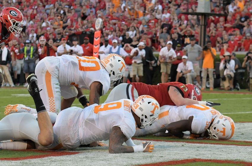 Oct 1, 2016; Athens, GA, USA; Tennessee Volunteers defensive lineman Corey Vereen (50) recovers a Georgia Bulldogs fumble in the end zone for a touchdown during the fourth quarter at Sanford Stadium. Tennessee defeated Georgia 34-31. Mandatory Credit: Dale Zanine-USA TODAY Sports