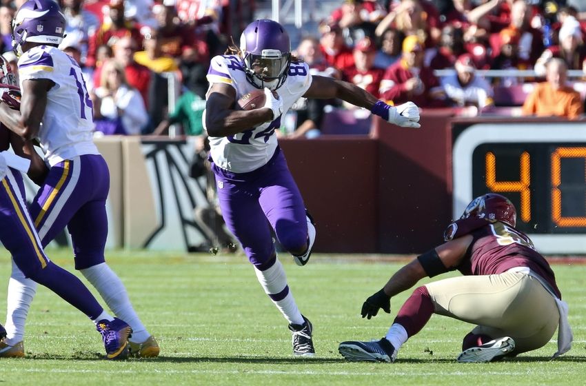 Nov 13, 2016; Landover, MD, USA; Minnesota Vikings wide receiver Cordarrelle Patterson (84) runs with the ball past Washington Redskins linebacker Will Compton (51) in the first quarter at FedEx Field. Mandatory Credit: Geoff Burke-USA TODAY Sports