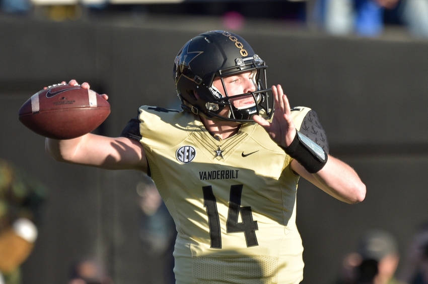 Nov 14, 2015; Nashville, TN, USA; Vanderbilt Commodores quarterback Kyle Shurmur (14) passes against the Kentucky Wildcats during the first half at Vanderbilt Stadium. Mandatory Credit: Jim Brown-USA TODAY Sports