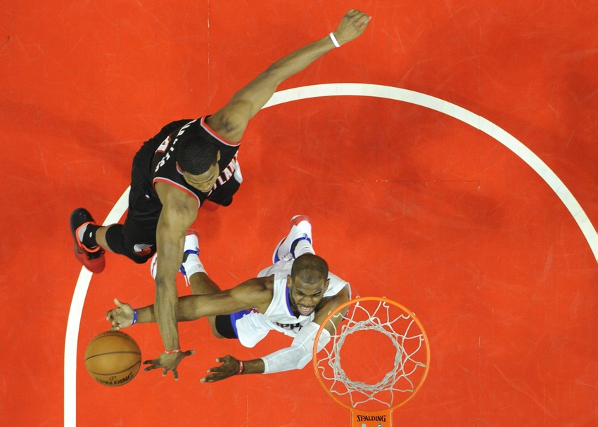 Apr 17, 2016; Los Angeles, CA, USA; Los Angeles Clippers guard Chris Paul (3) shoots against Portland Trail Blazers forward Maurice Harkless (4) during the second half in game one of the first round of the NBA Playoffs at Staples Center. Mandatory Credit: Richard Mackson-USA TODAY Sports