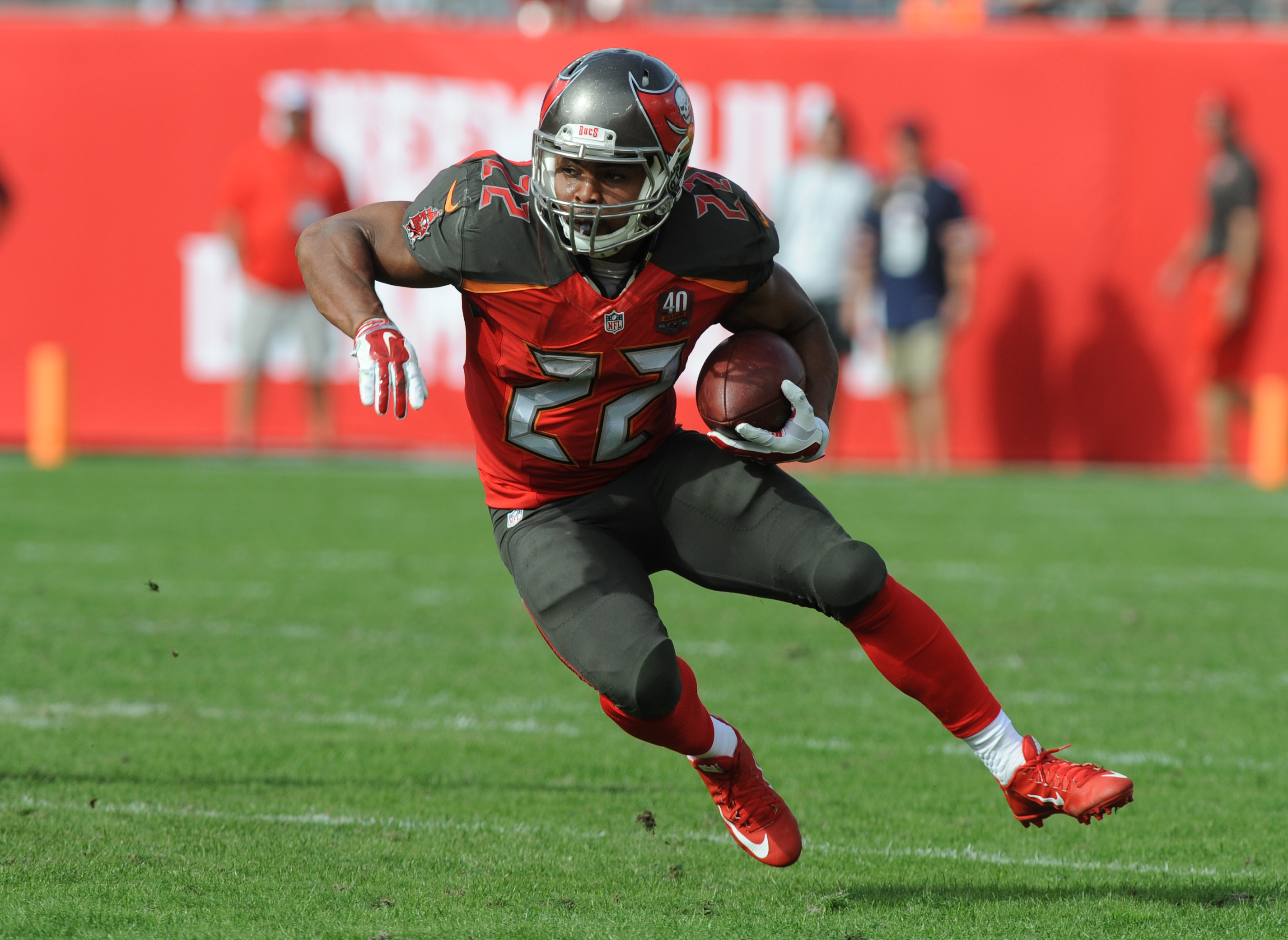 TAMPA, FL - DECEMBER 27: Running back Doug Martin #22 of the Tampa Bay Buccaneers runs with the ball against the Chicago Bears in the first second quarter at Raymond James Stadium on December 27, 2015 in Tampa, Florida. (Photo by Cliff McBride/Getty Images)