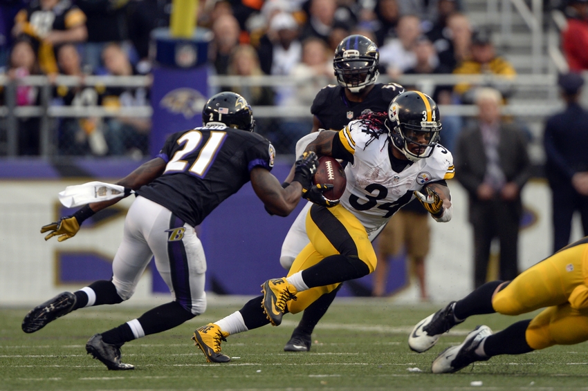Dec 27, 2015; Baltimore, MD, USA; Pittsburgh Steelers running back DeAngelo Williams (34) past Baltimore Ravens cornerback Lardarius Webb (21) during the fourth quarter at M&T Bank Stadium. Baltimore Ravens defeated Pittsburgh Steelers 20-17. Mandatory Credit: Tommy Gilligan-USA TODAY Sports