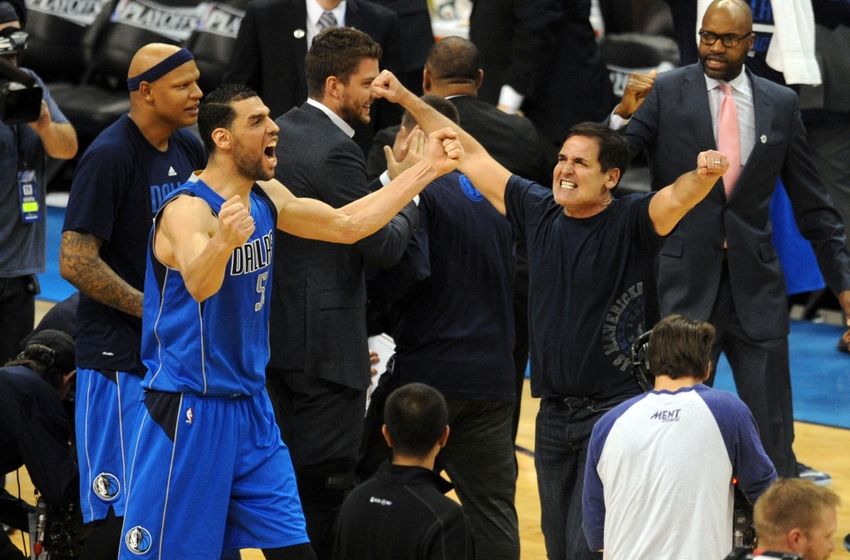 Apr 18, 2016; Oklahoma City, OK, USA; Dallas Mavericks center Salah Mejri (50) and Dallas Mavericks owner Mark Cuban celebrate after defeating the Oklahoma City Thunder 85-84 in game two of the first round of the NBA Playoffs at Chesapeake Energy Arena. Mandatory Credit: Mark D. Smith-USA TODAY Sports