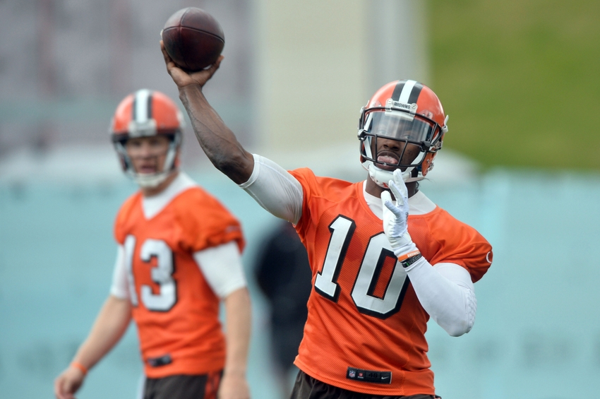 Jun 7, 2016; Berea, OH, USA; Cleveland Browns quarterback Robert Griffin III (10) throws a pass as quarterback Josh McCown (13) watches during minicamp at the Cleveland Browns training facility. Mandatory Credit: Ken Blaze-USA TODAY Sports