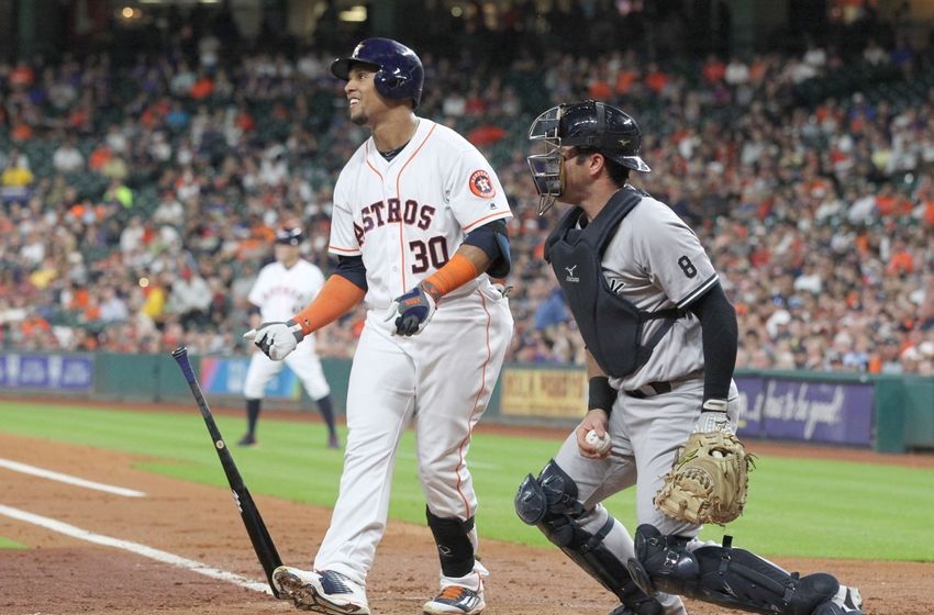 Jul 25, 2016; Houston, TX, USA; Houston Astros center fielder Carlos Gomez (30) strikes out to end the inning with a man in scoring position against the New York Yankees in the second inning at Minute Maid Park. Mandatory Credit: Thomas B. Shea-USA TODAY Sports