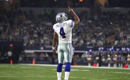 Aug 19, 2016; Arlington, TX, USA; Dallas Cowboys quarterback Dak Prescott (4) celebrates a touchdown in third quarter against the Miami Dolphins at AT&T Stadium. Dallas won 41-14. Mandatory Credit: Tim Heitman-USA TODAY Sports