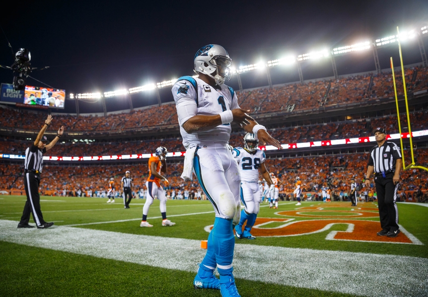 Sep 8, 2016; Denver, CO, USA; Carolina Panthers quarterback Cam Newton (1) dances as he celebrates his second quarter touchdown against the Denver Broncos at Sports Authority Field at Mile High. Mandatory Credit: Mark J. Rebilas-USA TODAY Sports