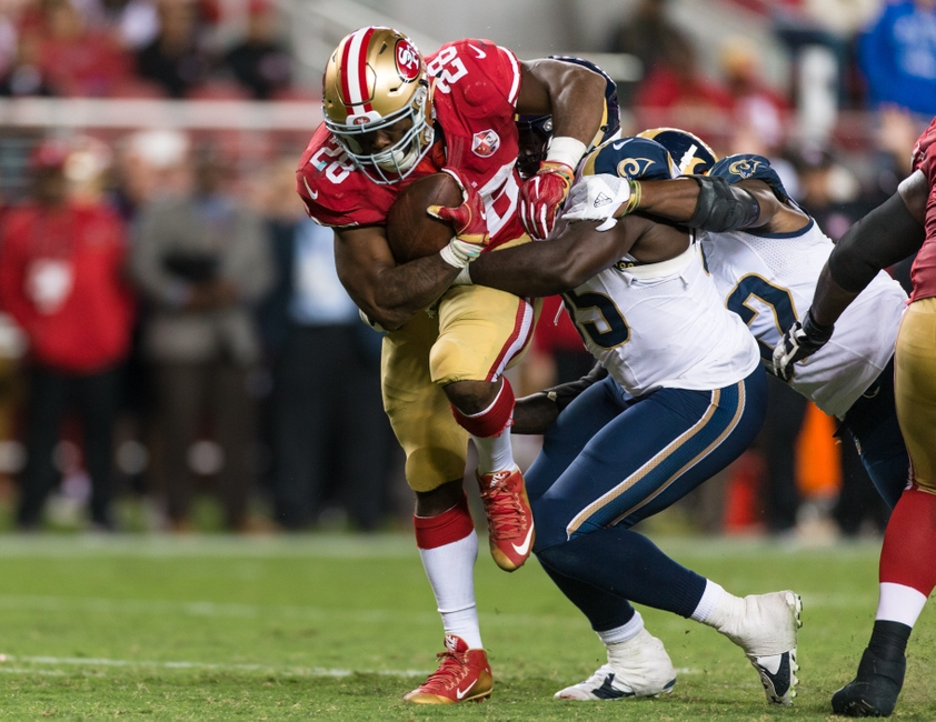 Sep 12, 2016; Santa Clara, CA, USA; San Francisco 49ers running back Carlos Hyde (28) runs the ball against the Los Angeles Rams in the fourth quarter at Levi