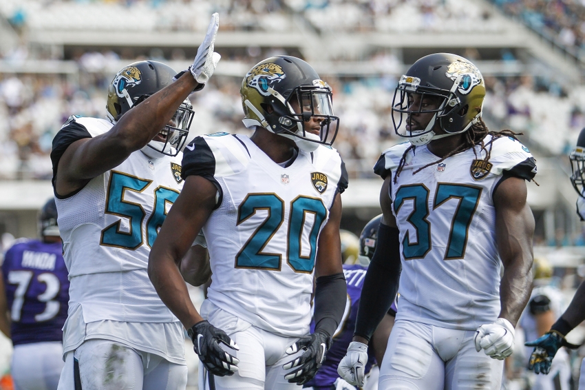 Sep 25, 2016; Jacksonville, FL, USA; Jacksonville Jaguars cornerback Jalen Ramsey (20) celebrates after a play with defensive end Dante Fowler (56) and strong safety Johnathan Cyprien (37) in the second quarter against the Baltimore Ravens at EverBank Field. Mandatory Credit: Logan Bowles-USA TODAY Sports