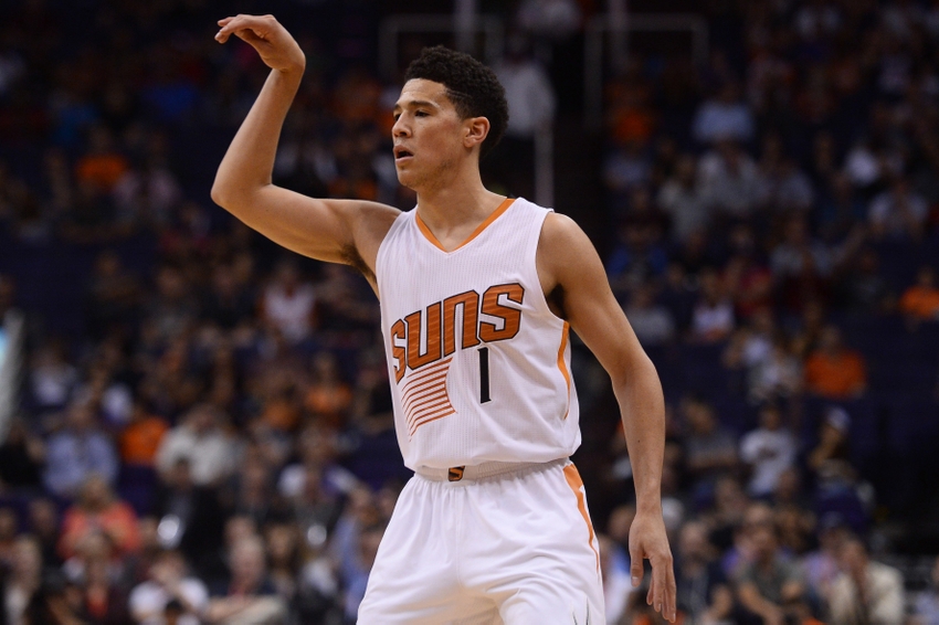 Apr 13, 2016; Phoenix, AZ, USA; Phoenix Suns guard Devin Booker (1) reacts after taking a jump shot against the Los Angeles Clippers at Talking Stick Resort Arena. The Suns won 114-105. Mandatory Credit: Joe Camporeale-USA TODAY Sports