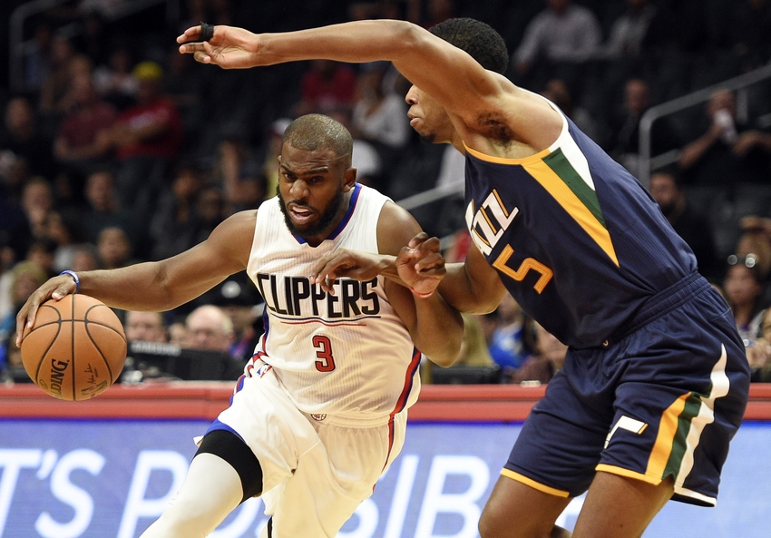 Oct 10, 2016; Los Angeles, CA, USA; Los Angeles Clippers guard Chris Paul (3) drives the ball defended by Utah Jazz guard Rodney Hood (5) during the first quarter at Staples Center. Mandatory Credit: Kelvin Kuo-USA TODAY Sports