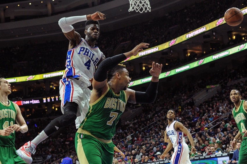 Mar 20, 2016; Philadelphia, PA, USA; Philadelphia 76ers forward Nerlens Noel (4) collides with Boston Celtics center Jared Sullinger (7) during the second quarter of the game at the Wells Fargo Center. Mandatory Credit: John Geliebter-USA TODAY Sports