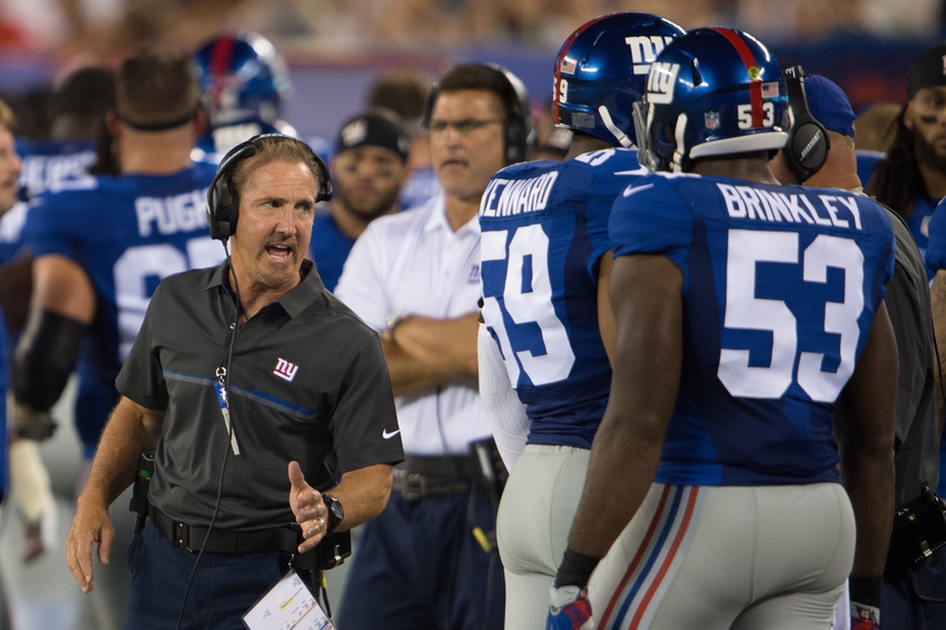 Aug 12, 2016; East Rutherford, NJ, USA; New York Giants defensive coordinator Steve Spagnuolo takes with New York Giants middle linebacker Jasper Brinkley (53) in the first half at MetLife Stadium. Mandatory Credit: William Hauser-USA TODAY Sports