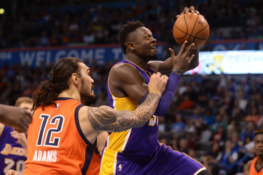 Oct 30, 2016; Oklahoma City, OK, USA; Oklahoma City Thunder center Steven Adams (12) fouls Los Angeles Lakers forward Julius Randle (30) during the second quarter at Chesapeake Energy Arena. Mandatory Credit: Mark D. Smith-USA TODAY Sports