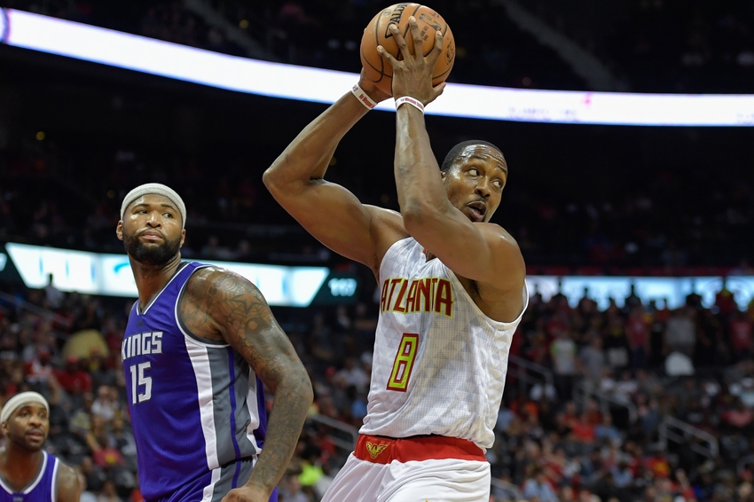 Oct 31, 2016; Atlanta, GA, USA; Atlanta Hawks center Dwight Howard (8) controls the ball in front of Sacramento Kings center DeMarcus Cousins (15) during the second half at Philips Arena. The Hawks defeated the Kings 106-95. Mandatory Credit: Dale Zanine-USA TODAY Sports
