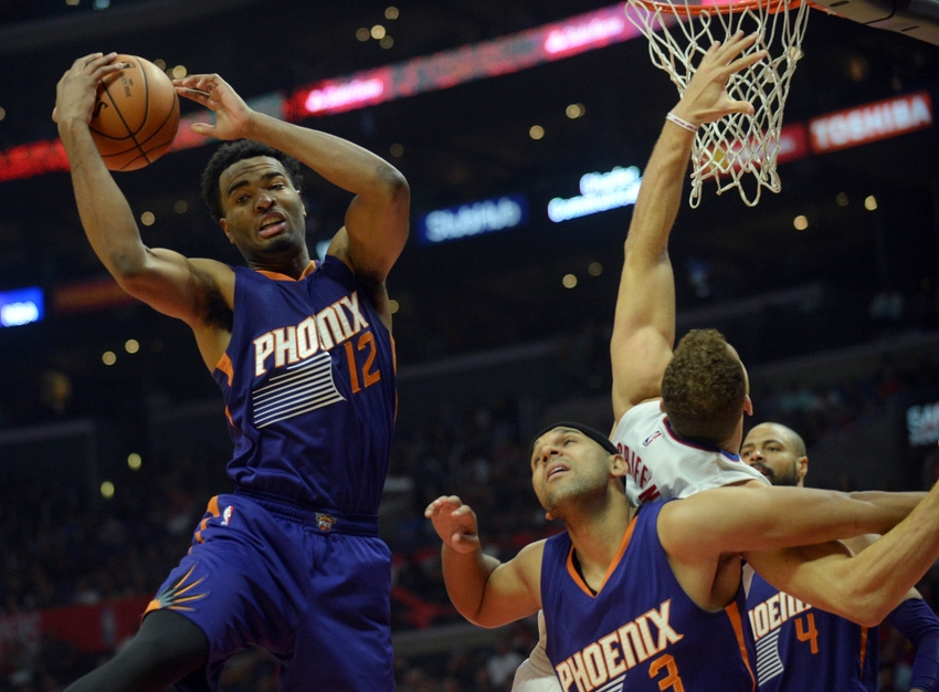 October 31, 2016; Los Angeles, CA, USA; Phoenix Suns forward T.J. Warren (12) grabs a rebound against the Los Angeles Clippers during the first half at Staples Center. Mandatory Credit: Gary A. Vasquez-USA TODAY Sports