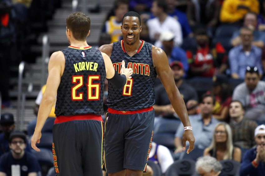 Nov 2, 2016; Atlanta, GA, USA; Atlanta Hawks center Dwight Howard (8) reacts to a play with guard Kyle Korver (26) in the first quarter of their game against the Los Angeles Lakers at Philips Arena. Mandatory Credit: Jason Getz-USA TODAY Sports