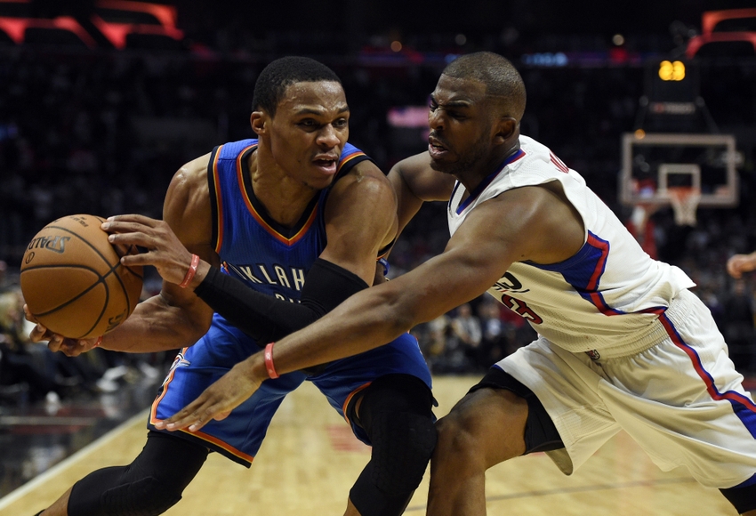 Nov 2, 2016; Los Angeles, CA, USA; Los Angeles Clippers guard Chris Paul (right) attempts to foul Oklahoma City Thunder guard Russell Westbrook (left) during the fourth quarter at Staples Center. The Oklahoma City Thunder won 85-83. Mandatory Credit: Kelvin Kuo-USA TODAY Sports