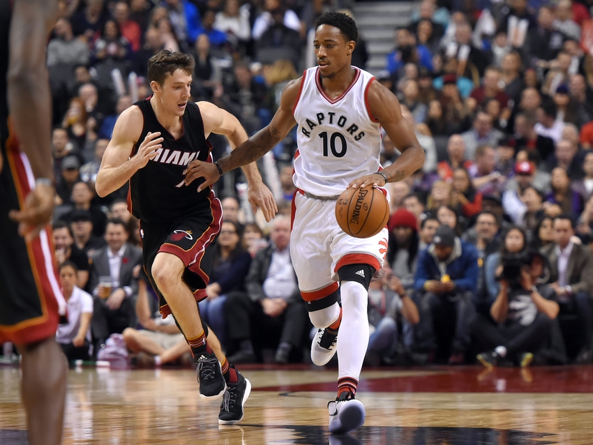 Nov 4, 2016; Toronto, Ontario, CAN; Toronto Raptors guard DeMar DeRozan (10) dribbles the ball up court as he fends off Miami Heat guard Goran Dragic (7) in the second half at Air Canada Centre. Mandatory Credit: Dan Hamilton-USA TODAY Sports